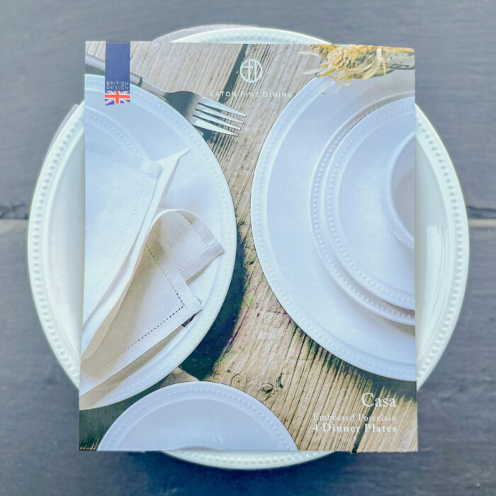 Overhead view of a pack of four Eaton Fine Dining Casa Dinner Plates